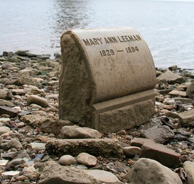 Tombstones along the Delaware River shoreline